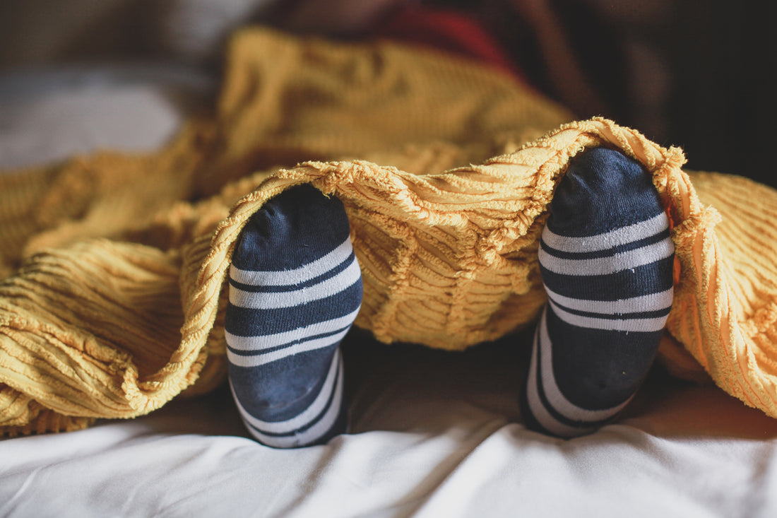 Grief in bed with socks