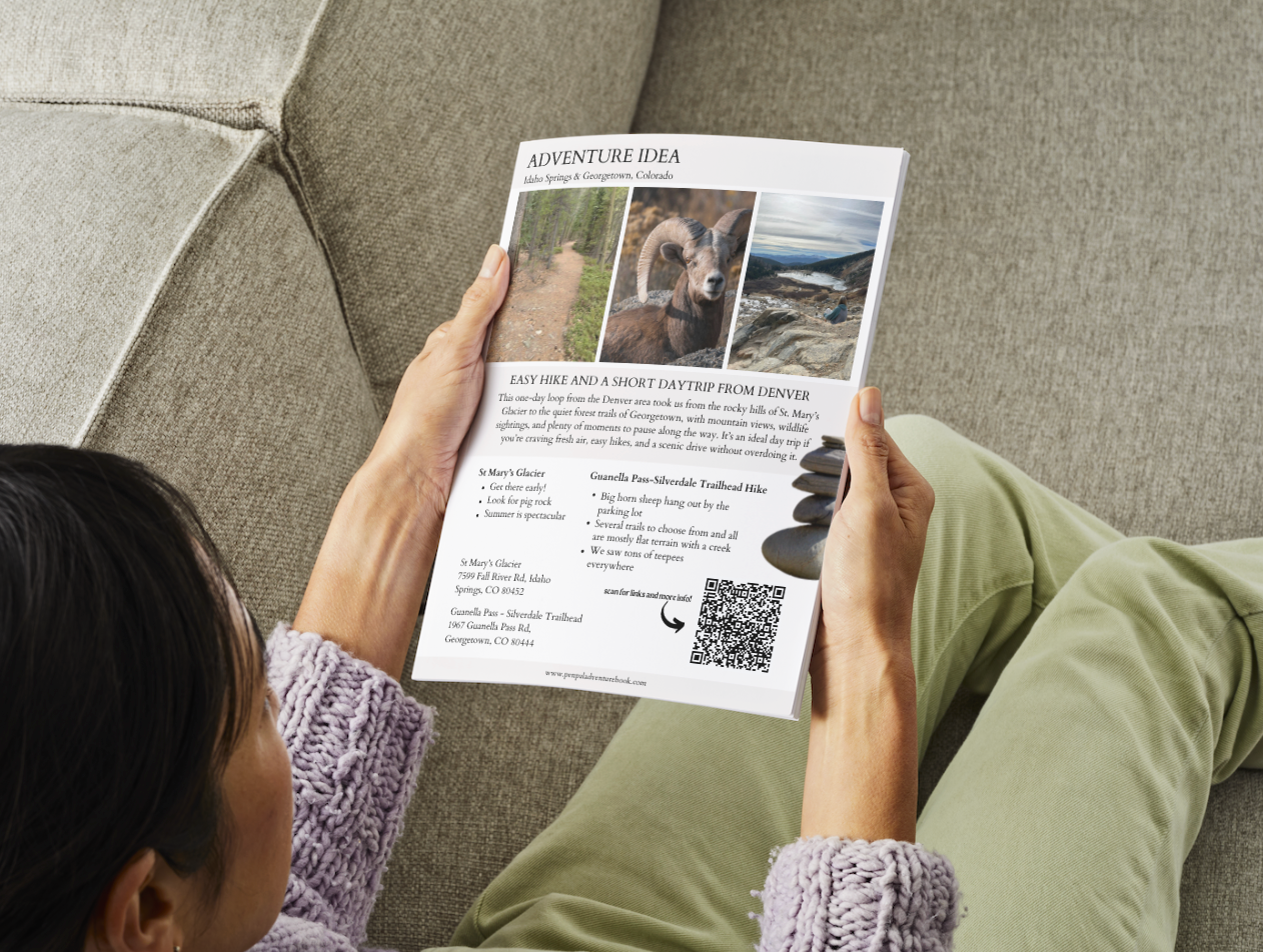 Person holding a printed document with QR code on a couch